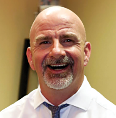 Dr. Joseph M. Dennis DC, chiropractor in Plano TX and founder of Dennis Family Wellness Center